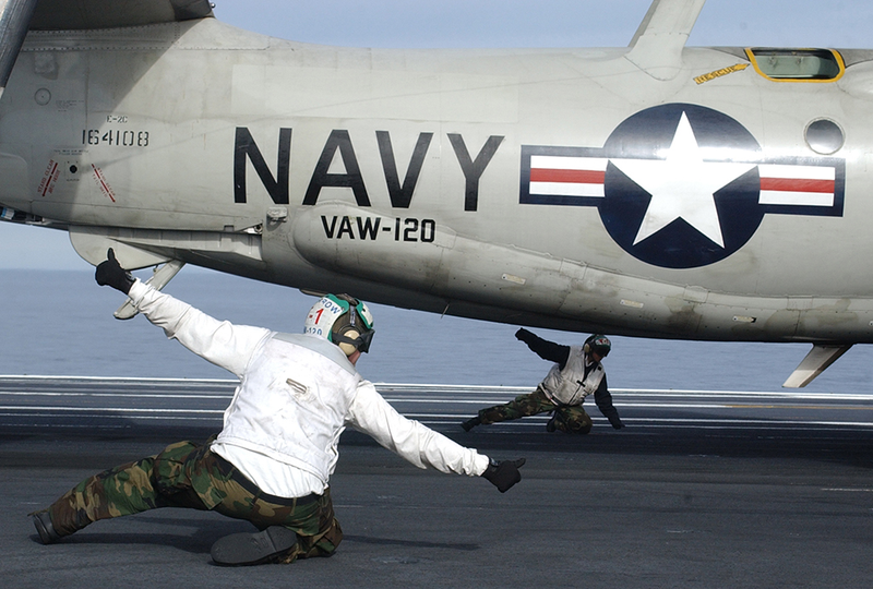 Illustration for article titled Here Is What All Those Colored Shirts Mean On An Aircraft Carrier's Deck